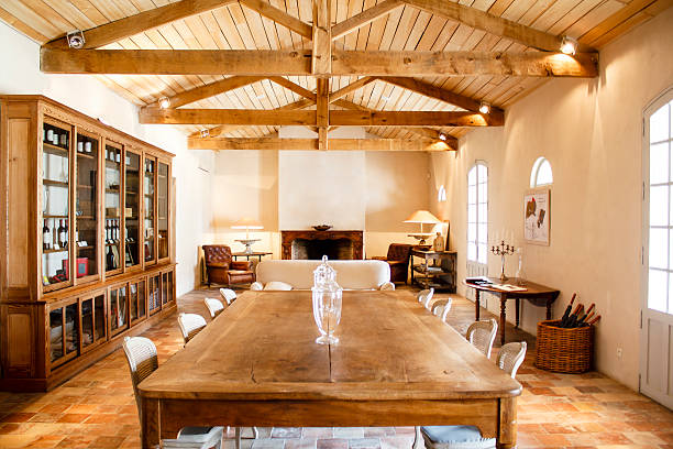 Home interior with roof beams Rich rural French house interior roof beam stock pictures, royalty-free photos & images