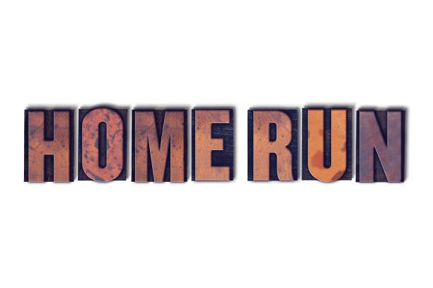 Home Run Concept Isolated Letterpress Word The words Home Run concept and theme written in vintage wooden letterpress type on a white background. home run stock pictures, royalty-free photos & images