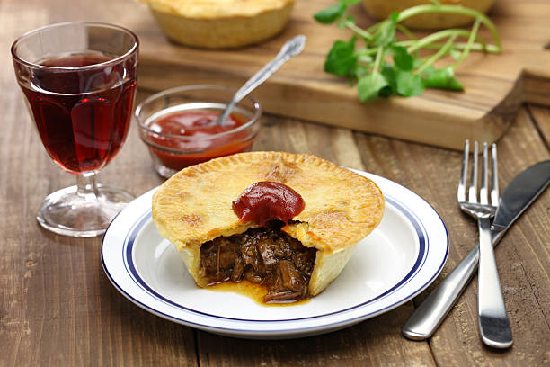 homemade aussie meat pie homemade aussie meat pie, close up meat pie stock pictures, royalty-free photos & images