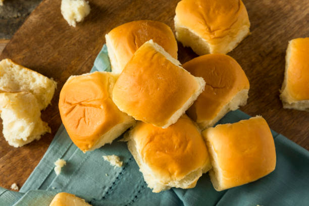 Homemade Baked Sweet Hawaiian Buns Homemade Baked Sweet Hawaiian Buns Ready to Eat bun bread stock pictures, royalty-free photos & images