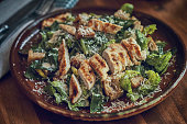Homemade Cesar Salad with Chicken, Lettuce and Parmesan