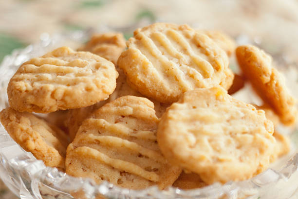 Homemade Cheddar cheese biscuits Close-up on Homemade Cheese biscuits. Macro photography with shallow DOF. savory food stock pictures, royalty-free photos & images