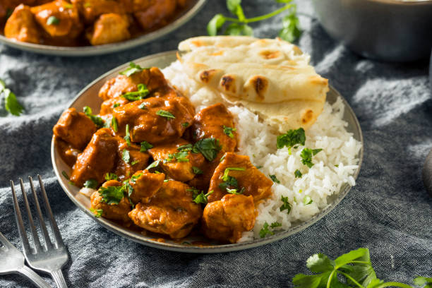 Homemade Chicken Tikka Masala Homemade Chicken Tikka Masala with Rice and Naan naan bread stock pictures, royalty-free photos & images