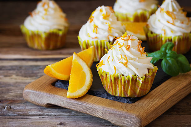 Homemade cupcakes with oranges stock photo