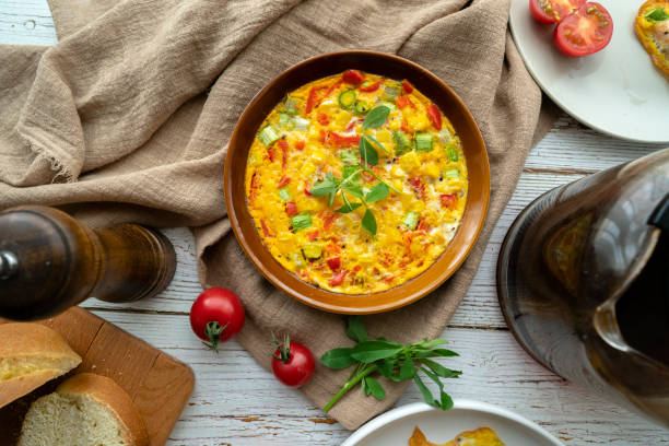 homemade frittata, made with egg, bell pepper and asparagas stock photo