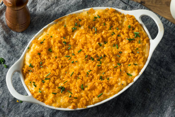 Homemade Funeral Potatoes Casserole Homemade Funeral Potatoes Casserole with Cheese and Chives casserole stock pictures, royalty-free photos & images