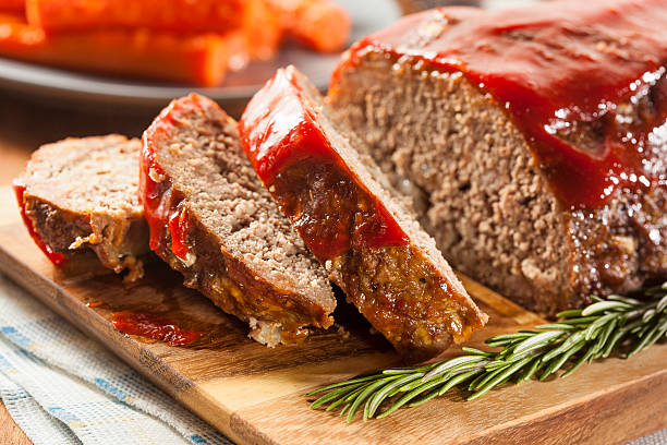 Homemade Ground Beef Meatloaf Homemade Ground Beef Meatloaf with Ketchup and Spices meatloaf stock pictures, royalty-free photos & images