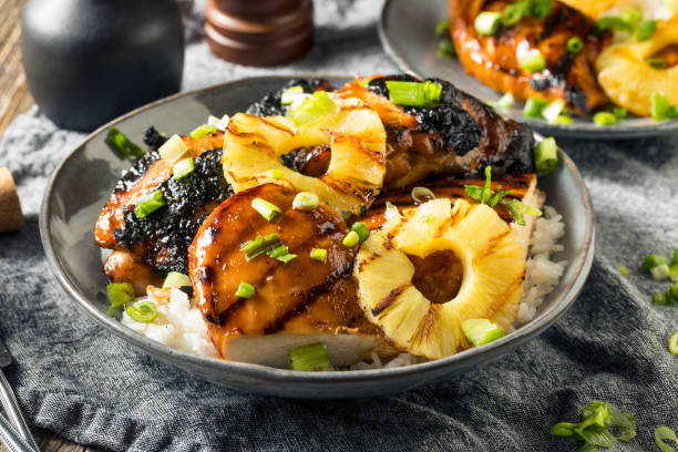 Homemade Hawaiian Huli Chicken Homemade Hawaiian Huli Chicken with PIneapple and Rice hawaiian culture stock pictures, royalty-free photos & images
