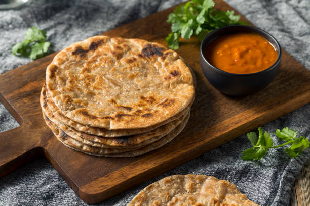 Homemade Indian Roti Chapati Bread Homemade Indian Roti Chapati Bread Ready to Eat chapatti stock pictures, royalty-free photos & images