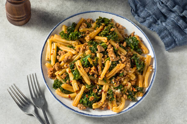 Homemade Kale and Sausage Caserecci Pasta stock photo