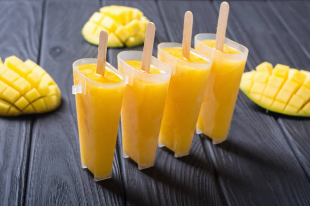 Homemade mango popsicle stock photo