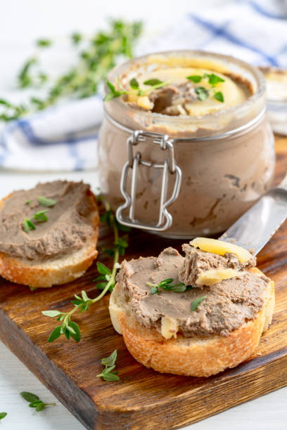 Homemade pate on baguette slices. stock photo