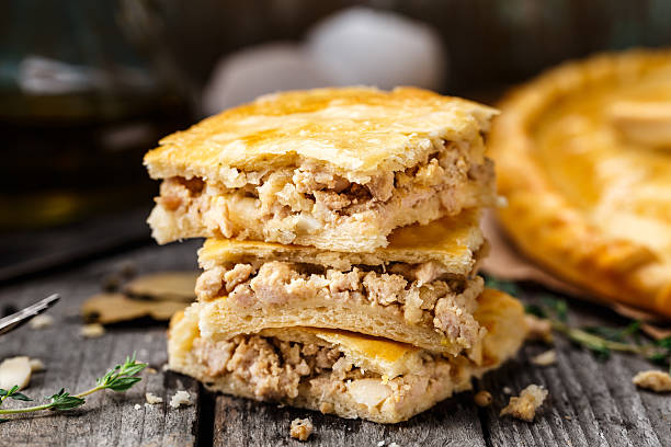 Homemade pie stuffed with chicken ang eggs stock photo