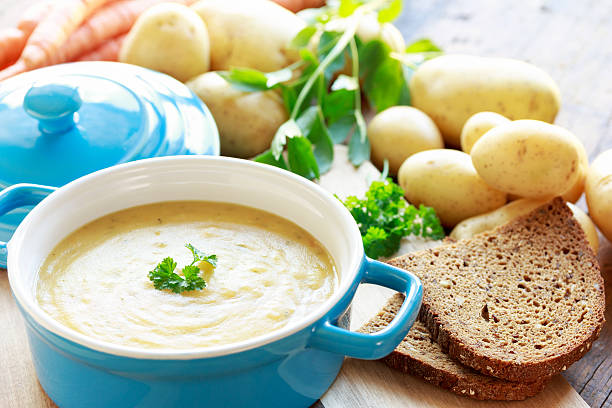 homemade potato soup with parsley stock photo