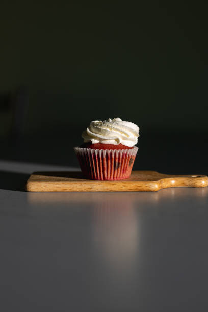 Homemade red velvet cupcake with cream cheese stock photo