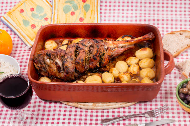 homemade roast lamb with potatoes stock photo