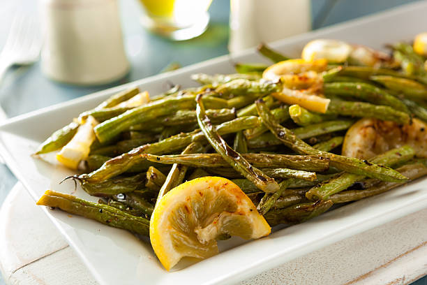 Homemade Sauteed Green Beans Homemade Sauteed Green Beans with Lemon and Garlic runner bean stock pictures, royalty-free photos & images