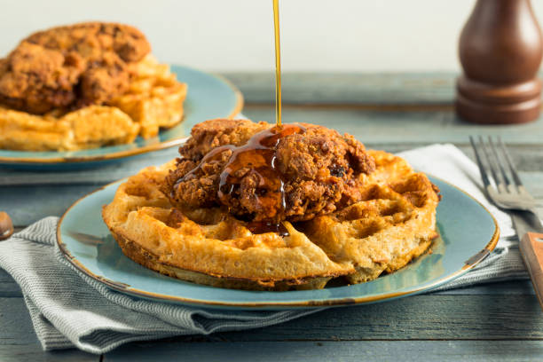 Homemade Southern Chicken and Waffles Homemade Southern Chicken and Waffles with Syrup chicken meat stock pictures, royalty-free photos & images