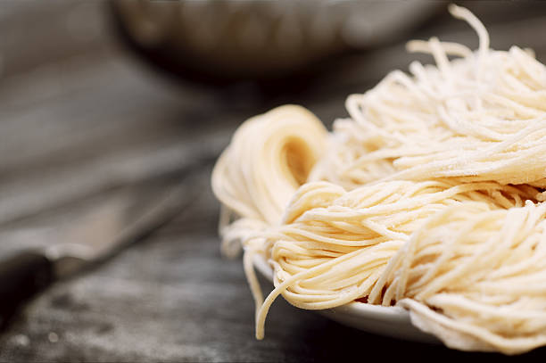 Homemade spaghetti noodles stock photo
