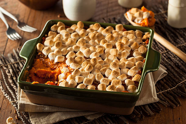 Homemade Sweet Potato Casserole Homemade Sweet Potato Casserole for Thanksgiving casserole stock pictures, royalty-free photos & images