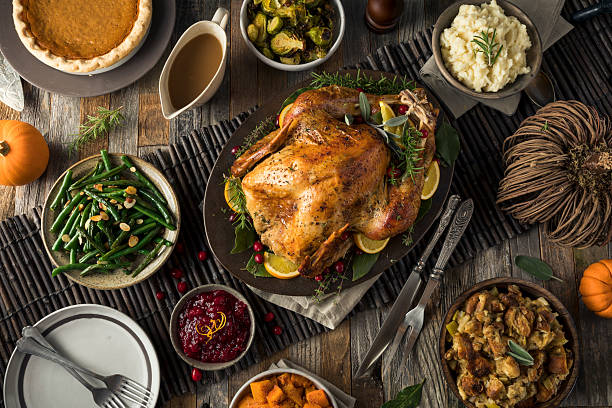 Homemade Thanksgiving Turkey Dinner Homemade Thanksgiving Turkey Dinner with All the Sides banquet stock pictures, royalty-free photos & images
