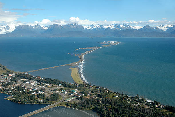 Homer Spit,Kachemak Bay,Alaska,USA Homer is a town located on the shore of Kachemak Bay in  the Kenai Peninsula. The Homer Spit is a 7 km long gravel road leading to Homer Harbour. kenai peninsula stock pictures, royalty-free photos & images