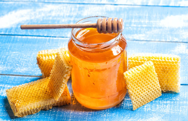 Honey and honeycomb stock photo
