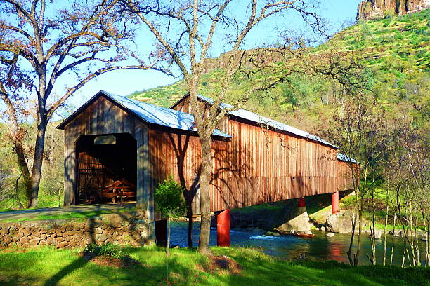 Honey Run Covered Bridge Honey Run Covered Bridge in Chico, California. It is the only triple-span covered bridge in the U.S. covered bridge stock pictures, royalty-free photos & images