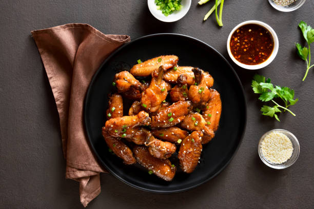 Honey-soy chicken wings stock photo
