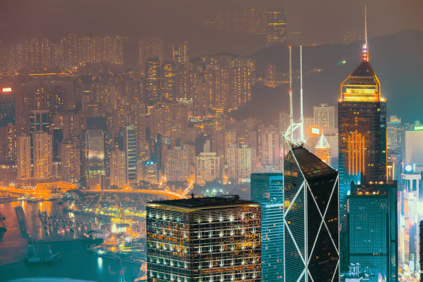 Hongkong city skyline from victoria peak at night stock photo