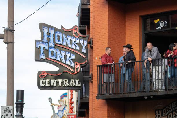 Honky-Tonk Central balconies overlooking Broadway. Nashville, Tennessee - March 23, 2019 : Honky-Tonk Central balconies overlooking Broadway. broadway nashville stock pictures, royalty-free photos & images