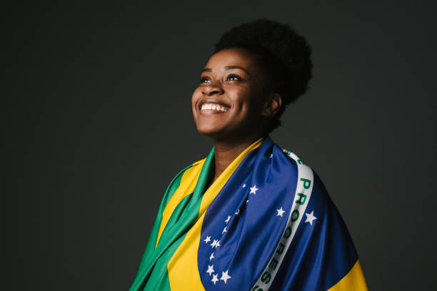 Hopeful woman Black woman, Brazilian woman, Brazilian flag, one young woman, studio photo brazilian culture stock pictures, royalty-free photos & images