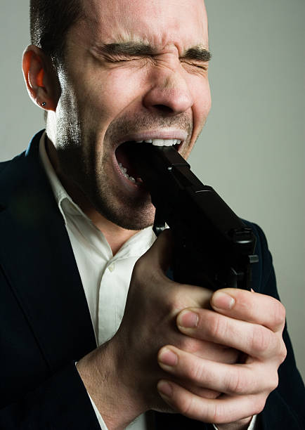 Gun In Mouth Stock Photos Pictures Royalty Free Images Istock