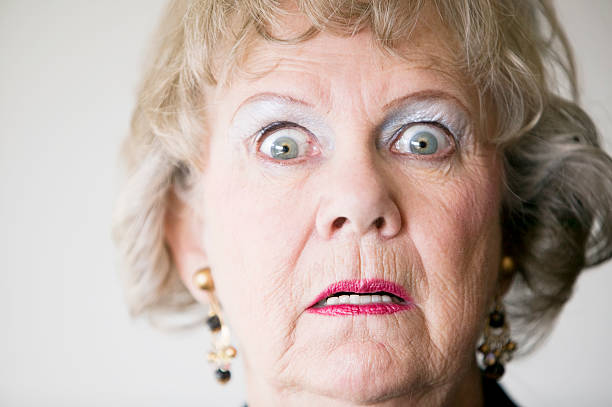 Horrified Senior Woman stock photo