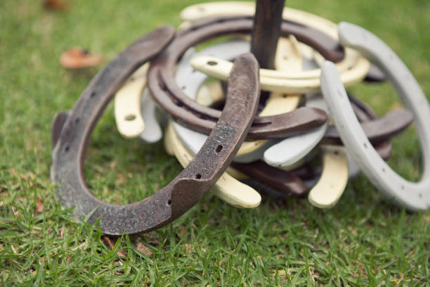 Horseshoes game Horseshoes, a game often played as a lawn game at weddings and at other celebrations horseshoe stock pictures, royalty-free photos & images