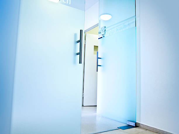 Hospital- open glass doors to the Operation area Hospital- open glass doors to the Operation area entrance sign stock pictures, royalty-free photos & images