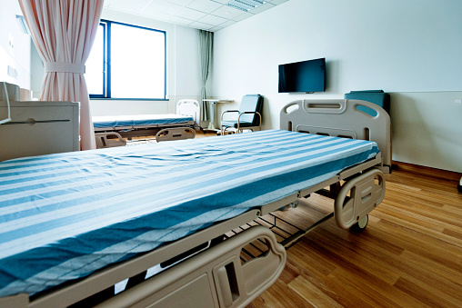 Hospital Ward With Beds And Armchairs Stock Photo - Download Image Now ...
