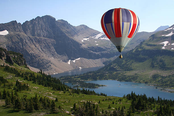 Hot Air Ballon Looking Down on Mountain Lake stock photo