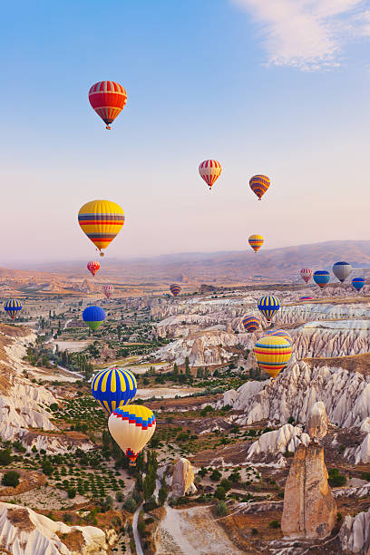 Hot air balloon flying over Cappadocia Turkey stock photo
