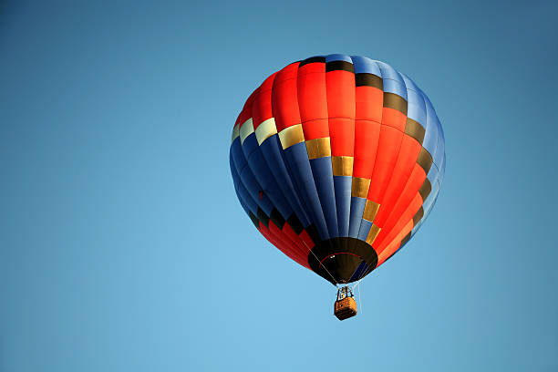 Hot Air Balloon Ride Closeup Colorful Hot Air Balloon Ride Closeup zero gravity carnival ride stock pictures, royalty-free photos & images