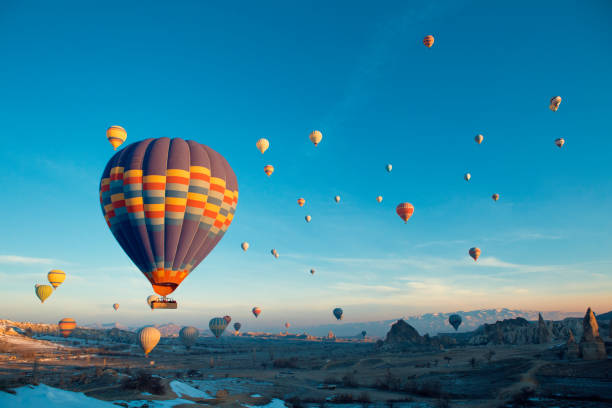 Hot air balloons in Cappadocia Hot air balloons in Cappadocia rock hoodoo stock pictures, royalty-free photos & images