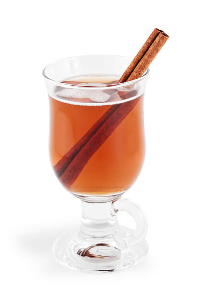 Hot Apple Cider with Clipping Path "Glass mug of hot apple cider with a cinnamon stick.  Isolated on white with clipping path.NB:  Clipping path might be available only for the largest size.  If the clipping path is important to you, please contact iStockphoto Support to find out their current policy for image sizes that include clipping paths." cider stock pictures, royalty-free photos & images