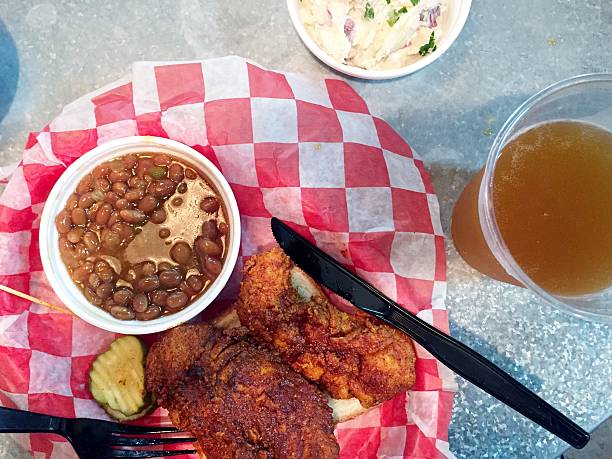 Hot Chicken with Beans, Potatoes and Beer stock photo