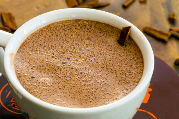 hot chocolate with cinnamon sticks - hot chocolate imagens e fotografias de stock