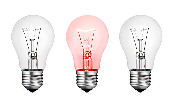 Hot Concept Idea - White and Red Lightbulb Isolated stock photo