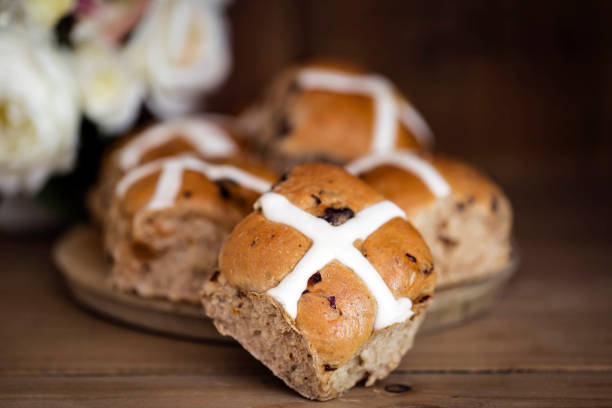 Hot Cross Buns Still Life with Flowers stock photo