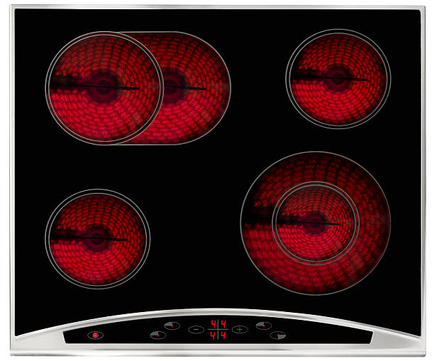 Hot electric hob Electric hob isolated on white,, rings turned on burner stove top stock pictures, royalty-free photos & images