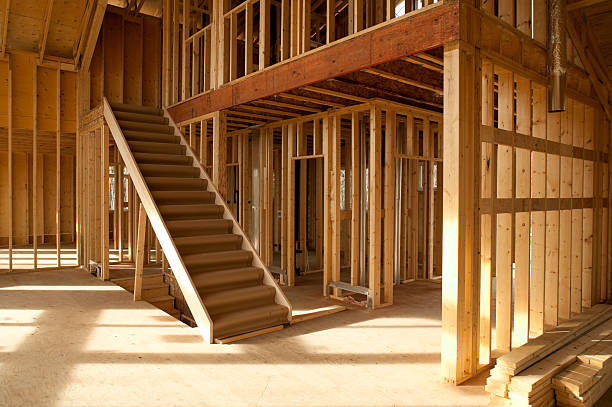 house construction site interior of house under construction wood framing studs post structure stock pictures, royalty-free photos & images