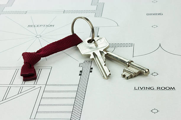 House keys and plans stock photo