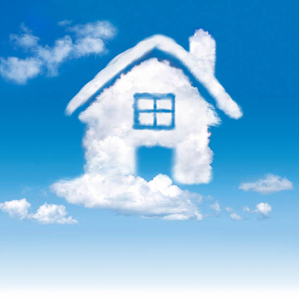 House of clouds in the blue sky stock photo